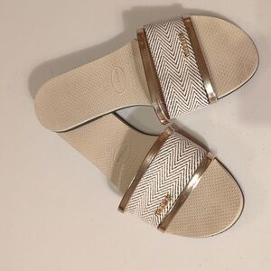 Havaianas, You Transcoso, cream and bronze tone accents rubber slides. Size 11.5